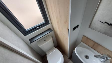 Gastentoilet met fontein in Rapidhome Bahiana