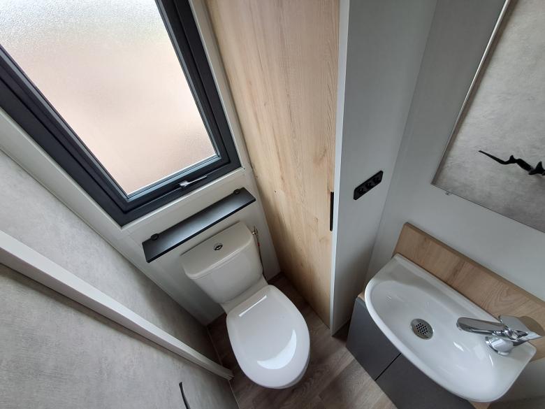 Gastentoilet met fontein in Rapidhome Bahiana